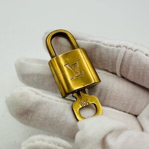 Louis Vuitton Gold Pad Lock